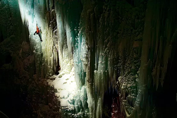 climber in an ice cave
