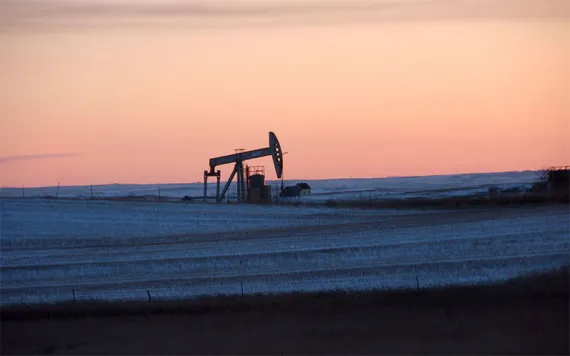 In this Feb. 25, 2015 photo, a pump jack for pulling oil from the ground is seen near New Town, N.D.