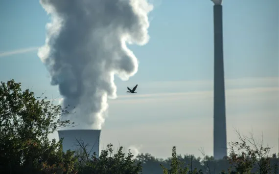Pollution and steam rise from the stacks of the Miami Fort Power Station near Cincinnati, Ohio, on October 2, 2025. (Photo by Jason Whitman/NurPhoto via AP)