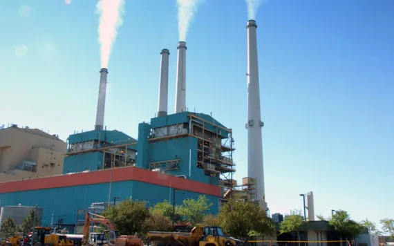 In this July 1, 2013, file photo, smoke rises from the Colstrip Steam Electric Station, a coal burning power plant in Colstrip, Montana