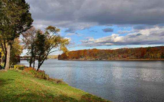 An autumnal view of 1011 2nd Ave Forest from across the river in Waterford, New York. 