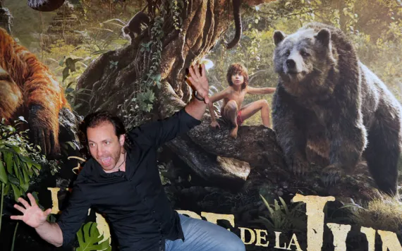Former French Olympic skater Philippe Candeloro poses during a photo call prior to the screening of the French premiere of "The Jungle Book" in Paris, France. | Photo courtesy of AP Photo/Francois Mori