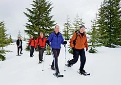 The author and her family test their newfound snow- tromping skills in the Cascade Mountains near Seattle.