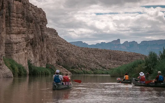 Visitors paddle on the Rio Grande through Big Bend National Park.