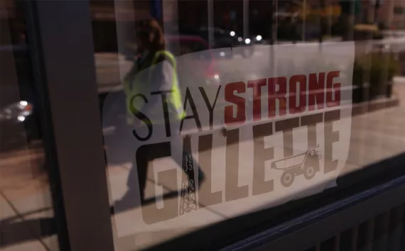 Scattershot subdivisions and the downtown business district in the classic coal boomtown of Gillette, Wyoming, contrast sharply with scenes of devastated earth at nearby mining operations.