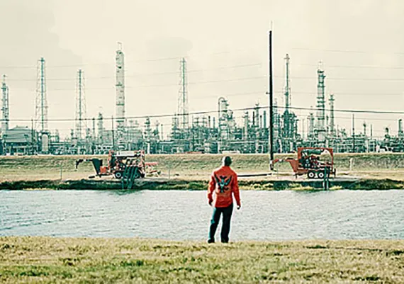 Eight major petrochemical and hazardous-waste facilities spew emissions into Hilton Kelley's neighborhood.