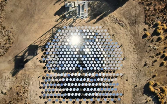mirrors in the desert arranged in rows as a demo for experimental cement tech