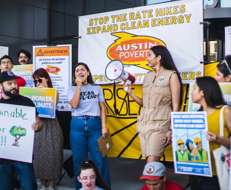 Protestors argue for fairer Austin Energy rates.