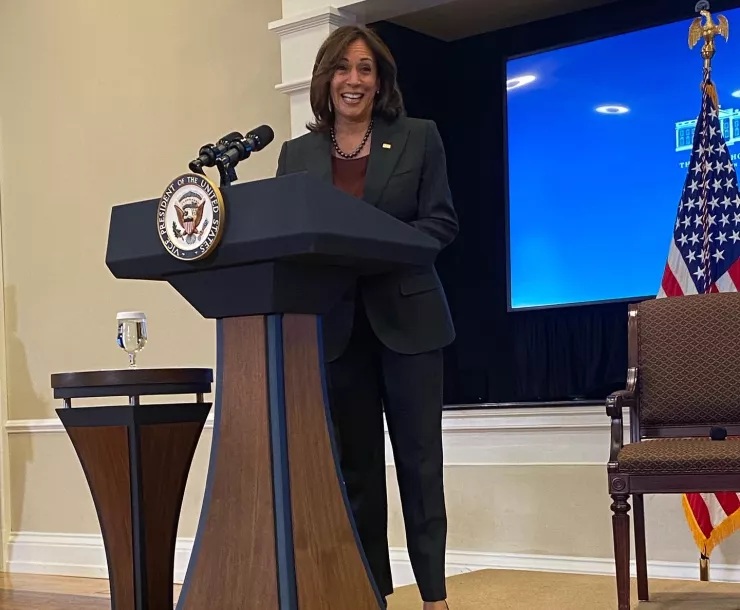 Photo of VP Kamala Harris speaking at a podium