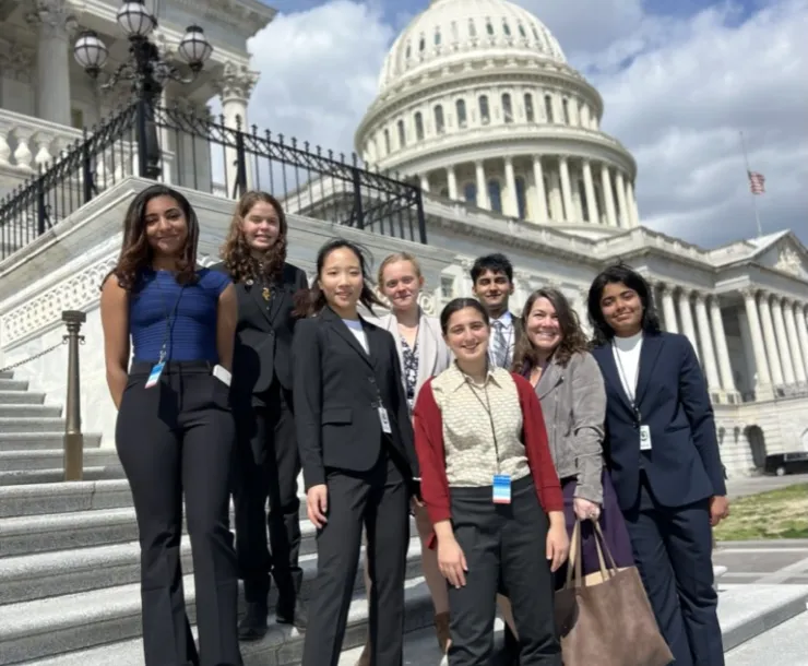 High school students standing on the steps of the capitol building