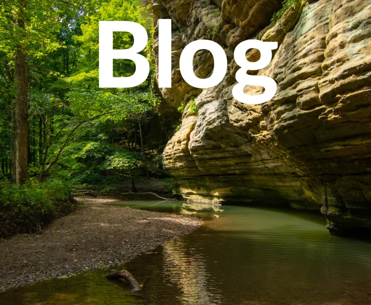 A photo of Starved Rock State Park in Illinois appears behind white text that reads, "Blog."