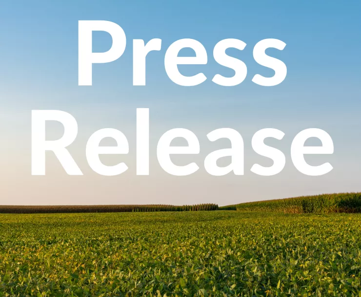 A photo of a field in Illinois appears behind text that reads, "Press Release."