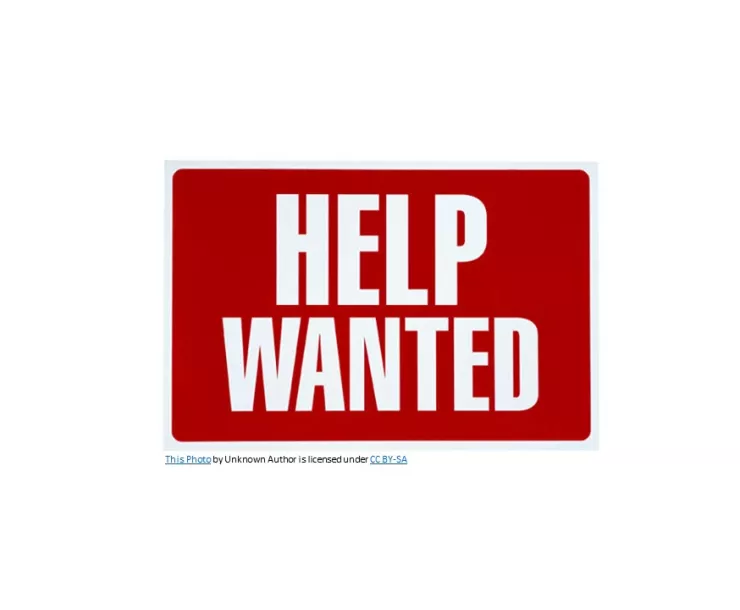 help wanted sign with white letters on red background