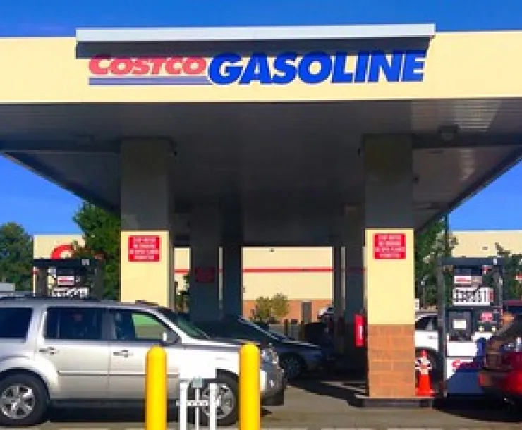 Costco gas station with cars.