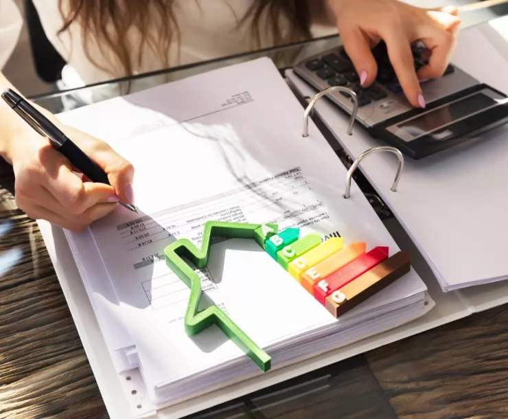 Woman calculating home energy savings