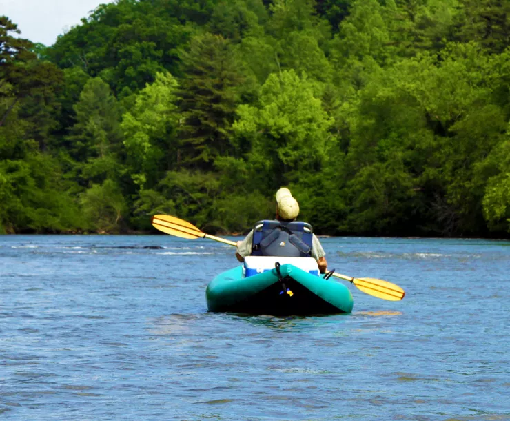 A kayaker paddles along the French Broad River Trail (Photo: NC.gov)