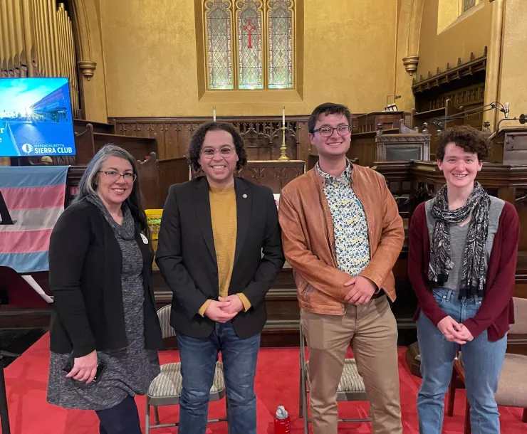 Sam and panelists at municipal climate leadership summit