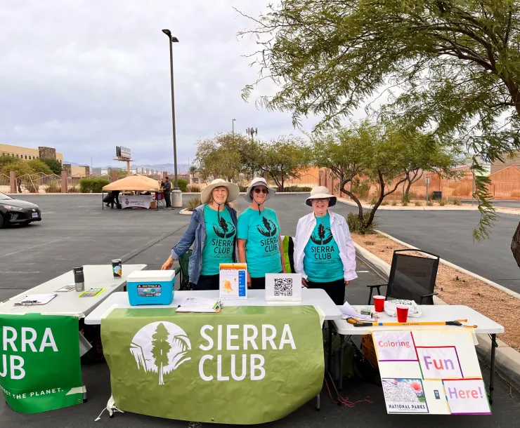 Volunteers working a booth