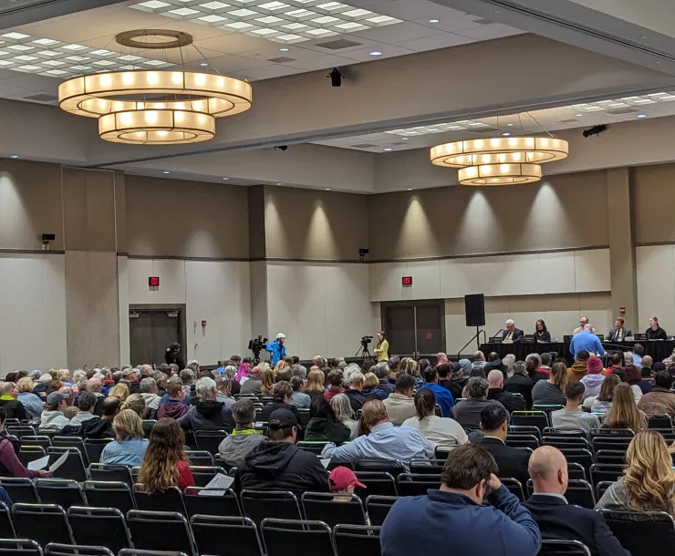 A packed room of hundreds of people for a rate case hearing.