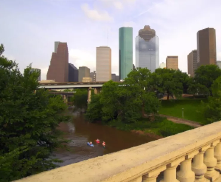 Paddlers from the Sabine Street Bridge - scaled