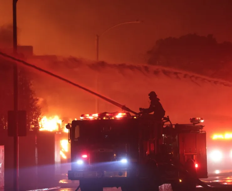 Firefighters fight the wildfires in LA