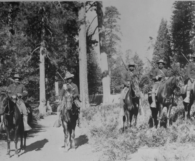 A group of Buffalo Soldiers from the 24th Infantry pose for a photo in 1899