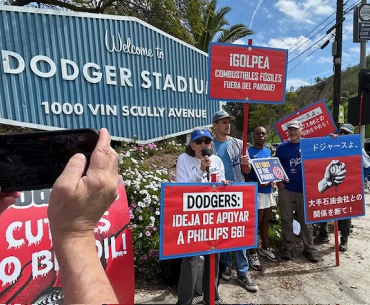 Dodgers fans protest the team's sponsorship with 76