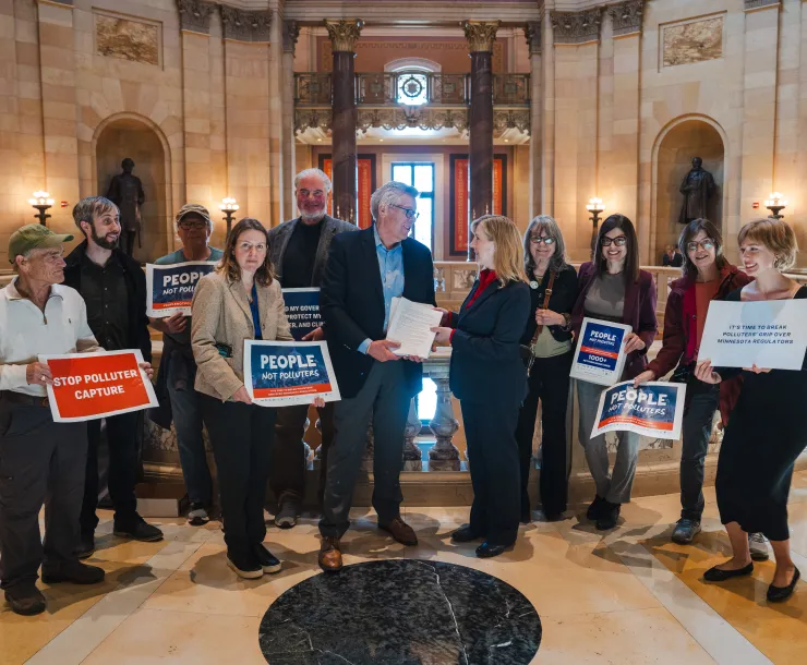 Sierra Club in the Minnesota State Capitol advocating for People not Polluters. Photo credit: Devon Young Cupery