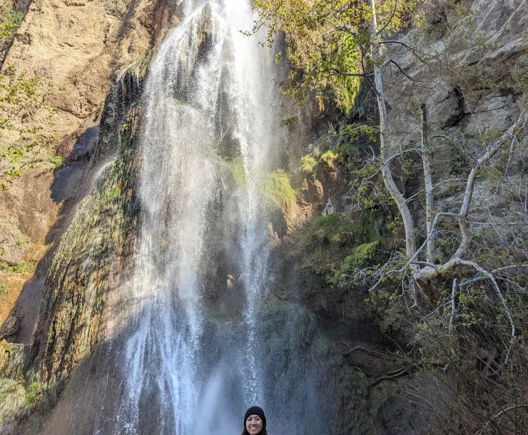Janelle by a waterfall
