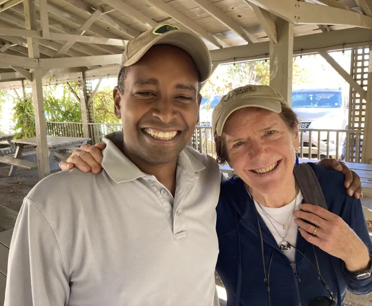 Joe Neguse with IPG member Becky Dickson