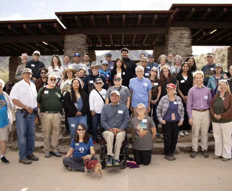 a group photo under a ramada