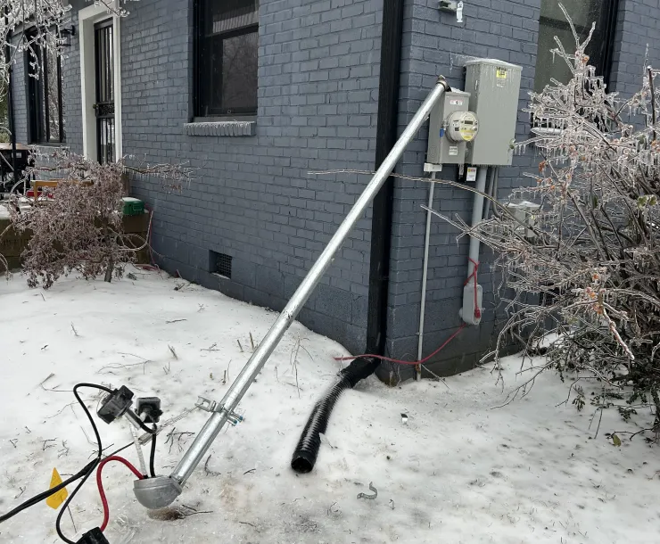 Power pole down on the ground