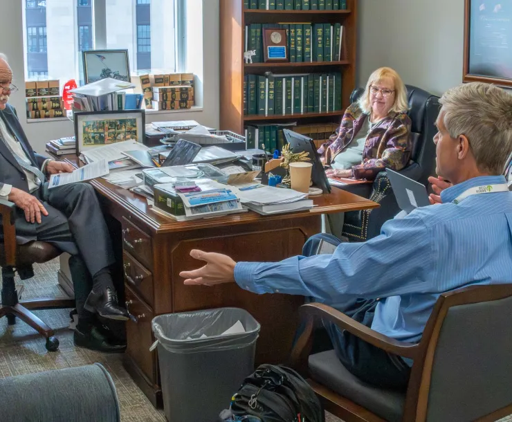 Dan Firth, Candace Tanner and Pat Cupples meet with Representative Bud Hulsey