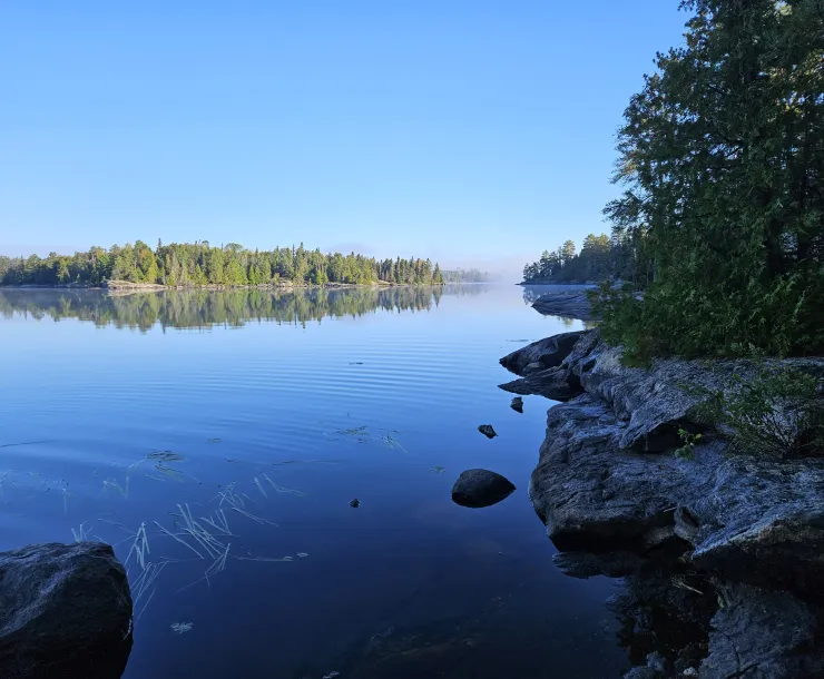 photo of Boundary Waters Canoe Area Wilderness on a clear, calm, sunny day