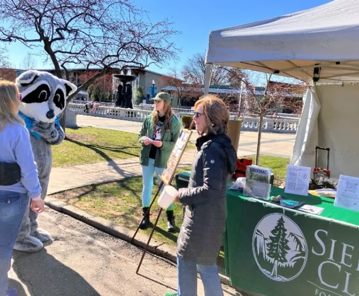 SEMG volunteers pose Environmental Jeopardy questions to Zoo volunteer Frank Raccoon during the Zoo’s Greenfest.	