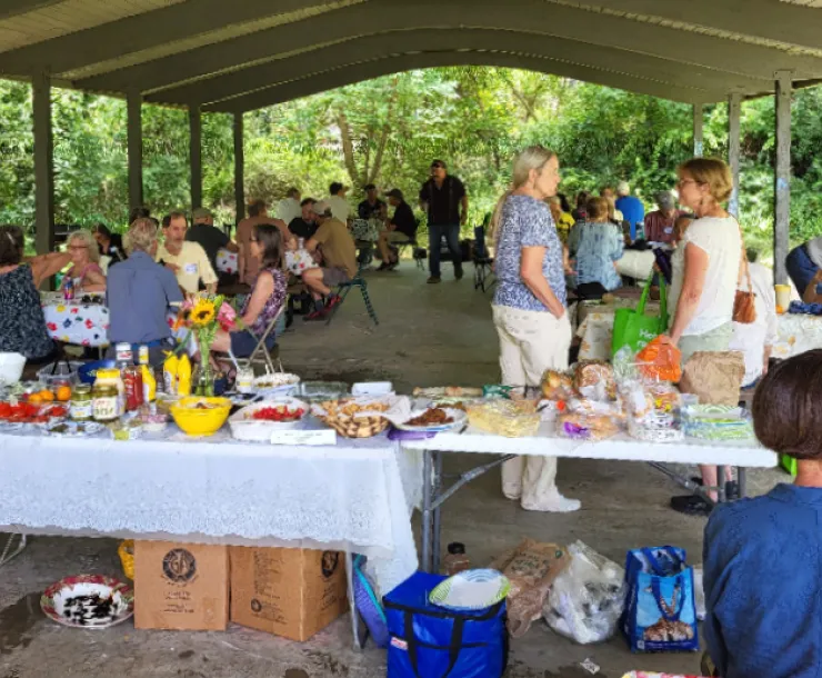 Members of the WNC Sierra Club gather in West Asheville for the annual summer picnic.