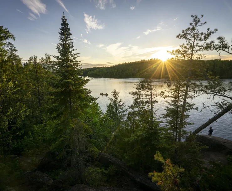 Sunshine over a lake in the Boundary Waters Canoe Area Wilderness. Photo credit: Alec Olson
