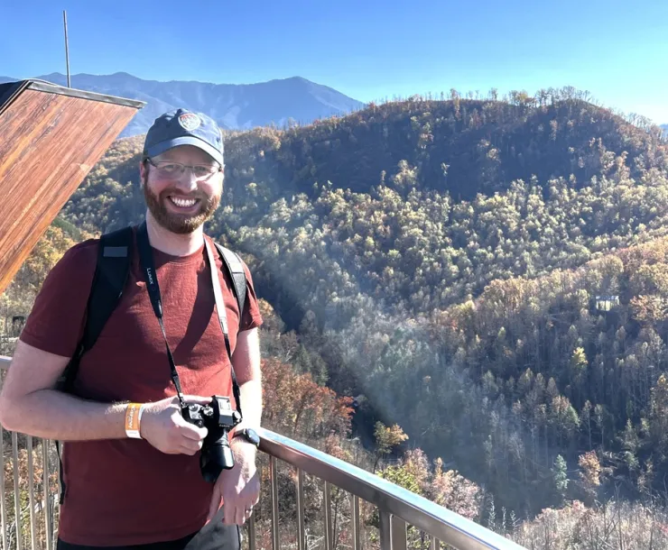 NC Chapter staff member Greyson Norcross is seen in the NC mountains