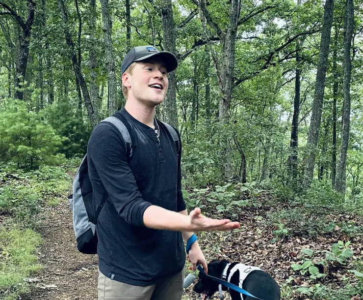 2026 summer fellow Luke Bernsen leads a hike
