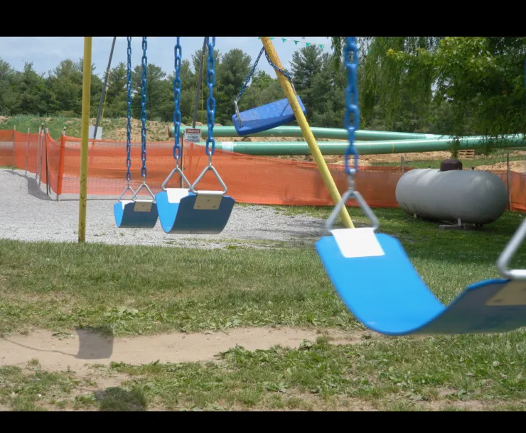 playground with pipeline in background