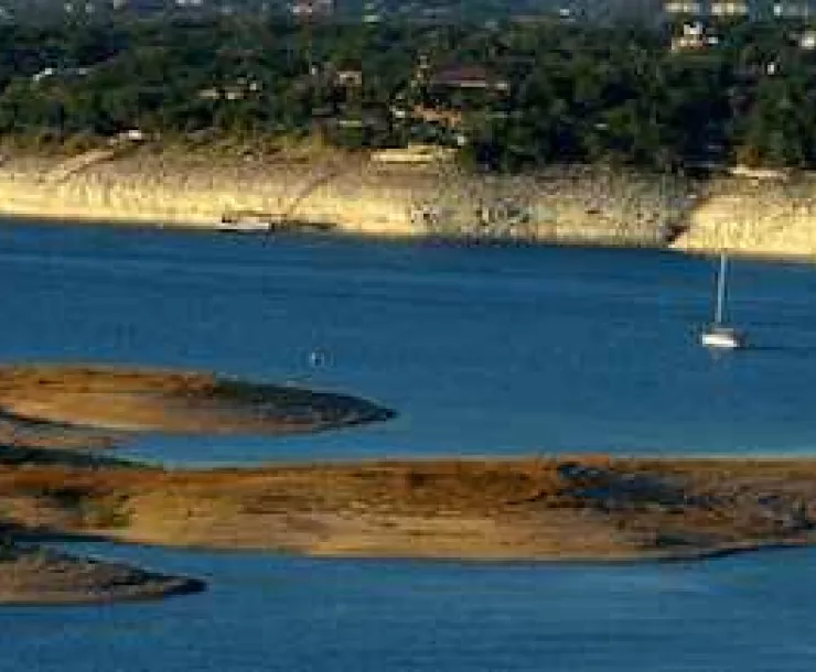 Lake-Travis-with-boat-Water-Supplies-Austin.jpg