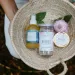 A pair of hands cradles a basket of gifts