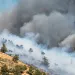 A wildfire burns in Oregon on the side of a mountain