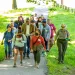 Attendees at the 2022 Outdoors Alliance for Kids Week walk along a path.