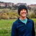 Steve Myers wears a knit cap and smiles at the camera.