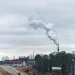 Industrial smokestacks of paper mill factory plant in manufacturing Alabama