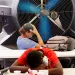 People try to keep cool at the Justa Center, a resource center catering to the older homeless population, as temperatures hit 110-degrees, July 19, 2022, in Phoenix.