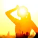 Double exposure portrait of young fitness Woman hand wiping sweat and summer heat wave concept