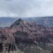 The view of Grand Canyon from the back of the North Rim Lodge in Grand Canyon National Park on a stormy day.
