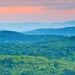 Tree covered Vermont Mountains at Sunrise.
